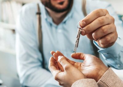 handing keys to homeowner