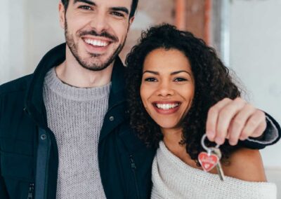smiling with house keys